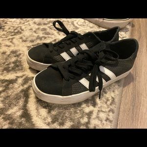 ADIDAS. Women’s black and white striped/soled sneakers. Size 8.